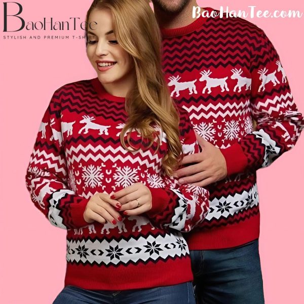 Couple wearing red reindeer Christmas sweaters