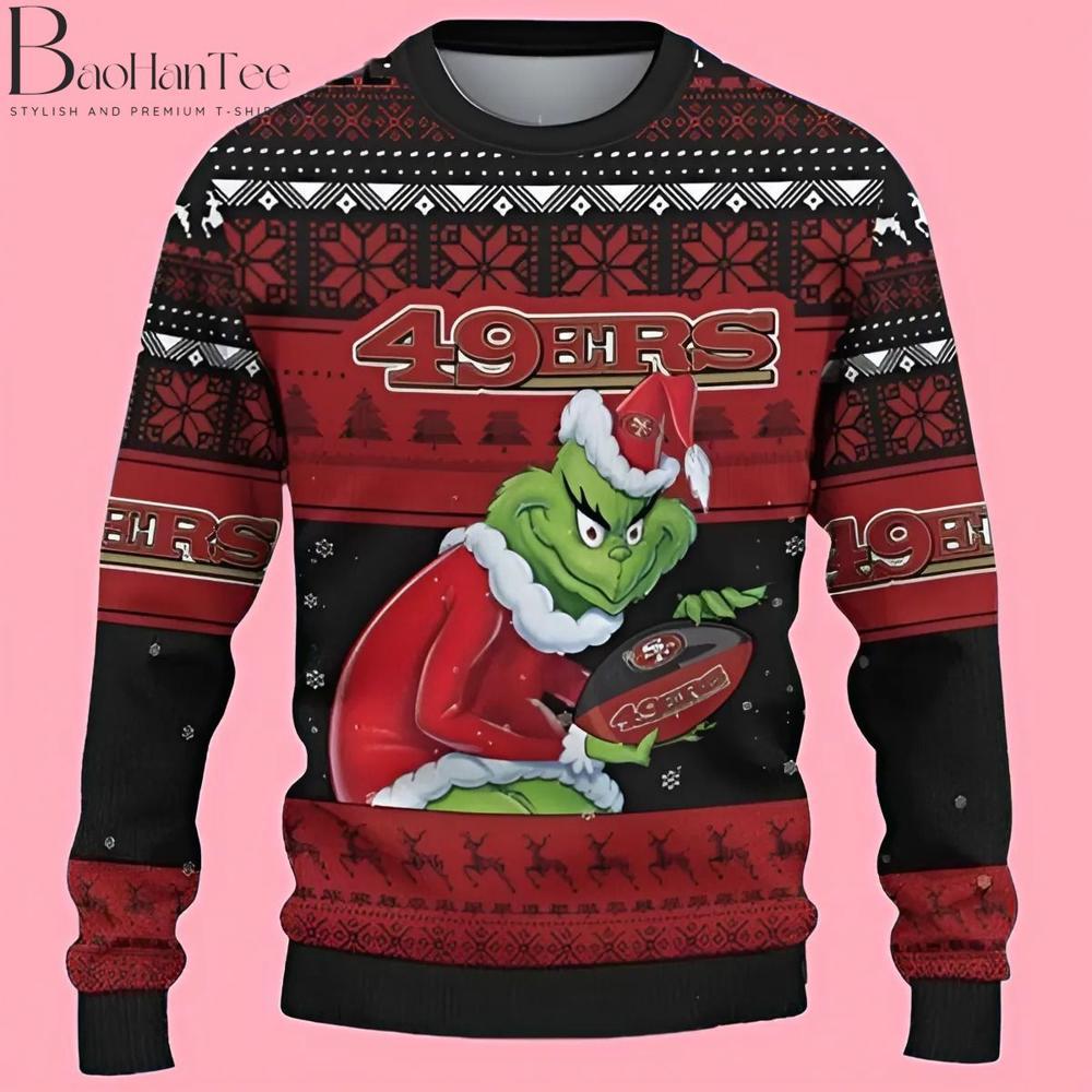 A darker take on the 49ers Grinch sweater, this black version adds an extra touch of edginess. The Grinch, still with that signature sneaky smile, holds the 49ers football with pride. The black background makes the red accents pop, giving it a sleek, modern look.