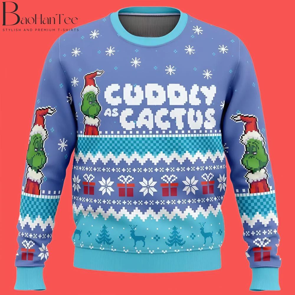 This fun and humorous sweater features the phrase “Cuddly as a Cactus,” perfectly capturing the Grinch’s sarcastic spirit. Against a cheerful blue background, the Grinch’s face peeks out, surrounded by Christmas gifts, snowflakes, and traditional holiday patterns.