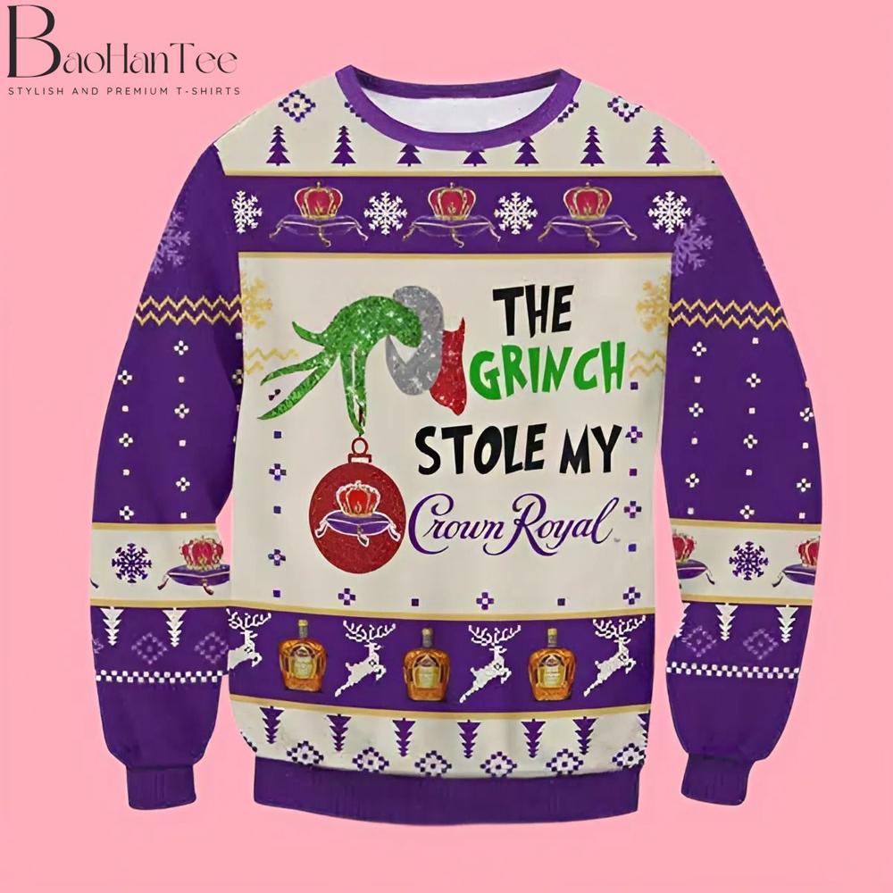 This cheeky sweater features the Grinch “stealing” a bottle of Crown Royal, making it a hit with fans of the whiskey brand. The design includes purple and gold accents that mimic the Crown Royal color scheme, adding a touch of holiday spirit to the mischief.